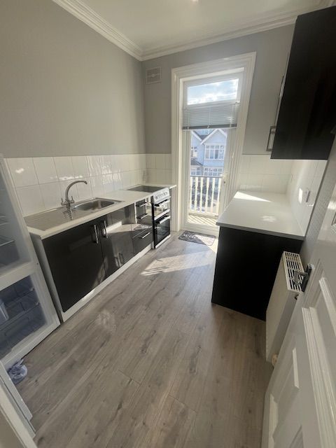 Property photo 1 of 8 Kitchen