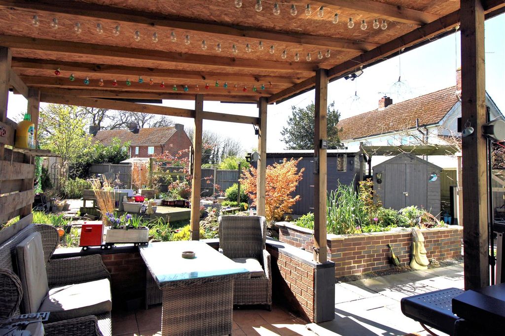 Property photo 2 of 22 Covered Seating Area