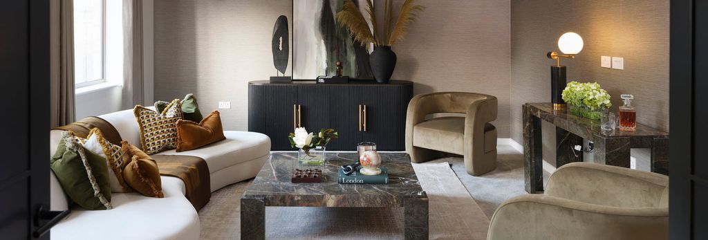 Property photo 1 of 8 Modern Decorated Living Space Or Waiting Room, With Coffee Table, Seating, Cabinets And Side Table