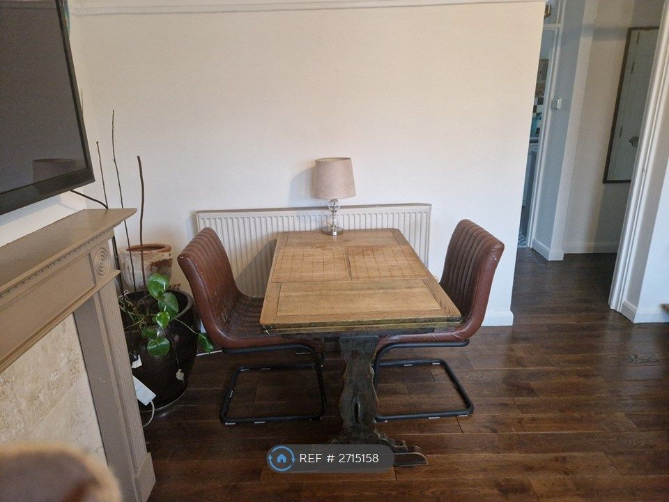 Property photo 3 of 12 Living Room/Dining Area