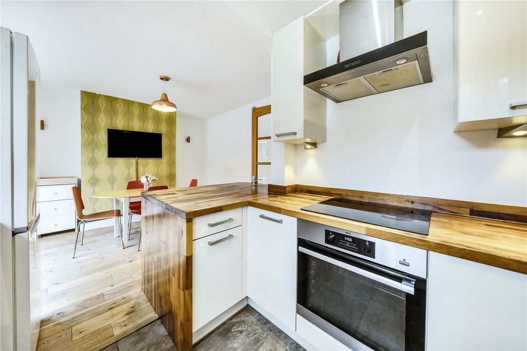 Property photo 3 of 17 Dining Kitchen