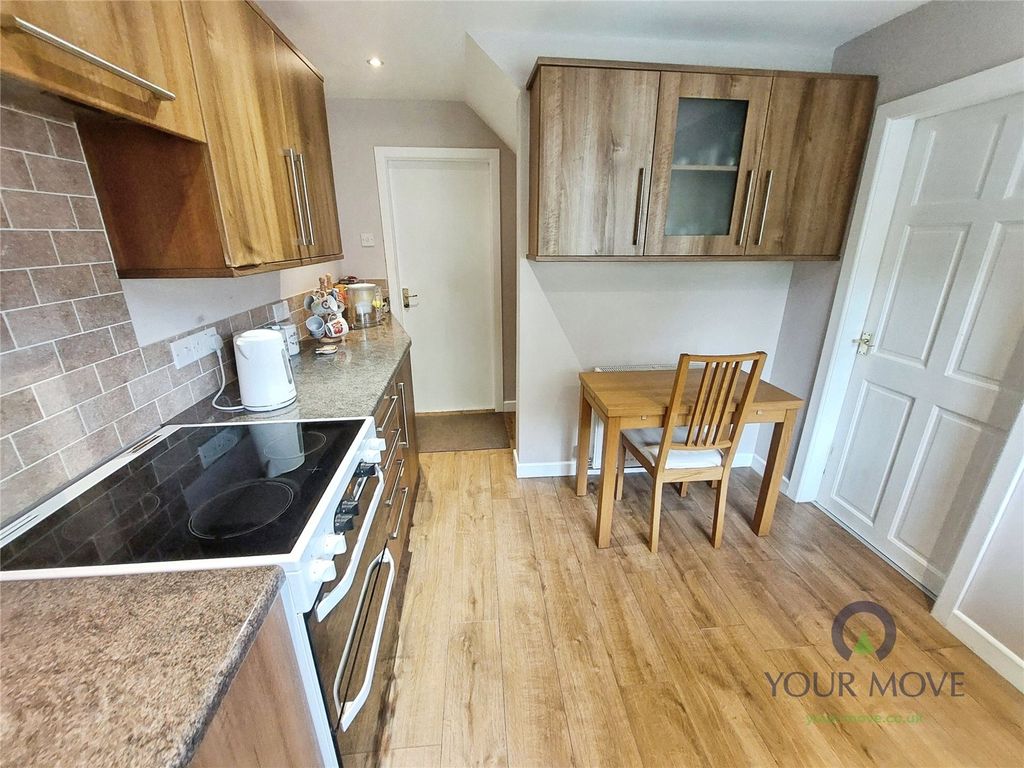 Property photo 2 of 16 Kitchen Area