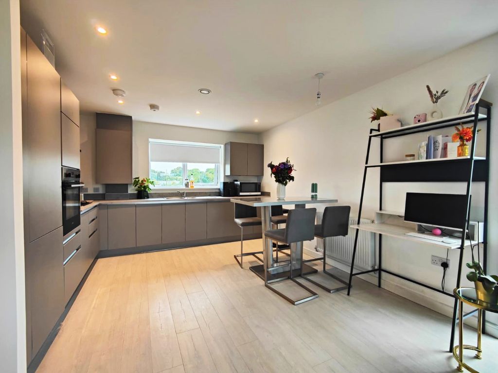 Property photo 3 of 8 Open Kitchen liv