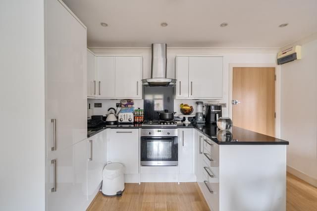 Property photo 3 of 12 Kitchen