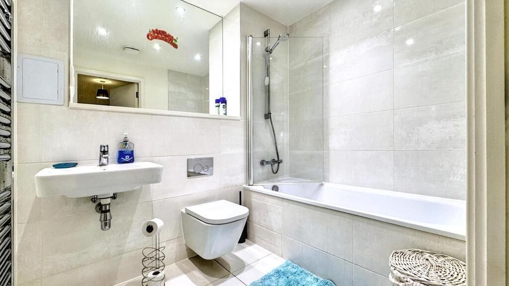 Property photo 2 of 10 Bright, Modern Bathroom With A Full Bath And Showe...