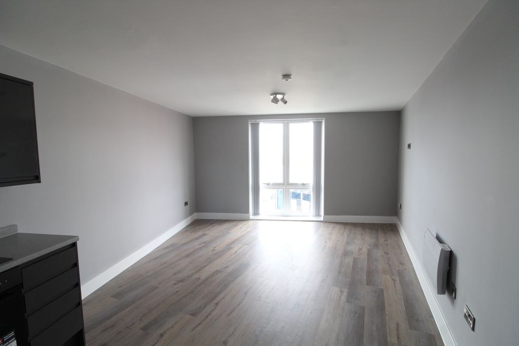 Property photo 3 of 9 Living Area