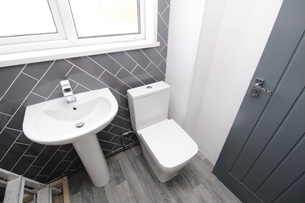 Property photo 3 of 4 Modern Bathroom With Stylish Charcoal Tiling...