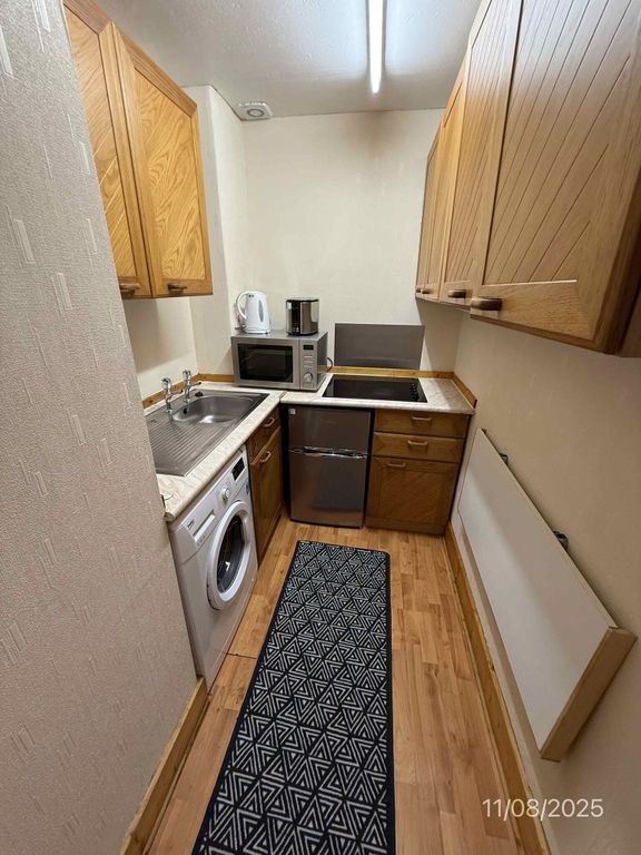 Property photo 2 of 9 Kitchen