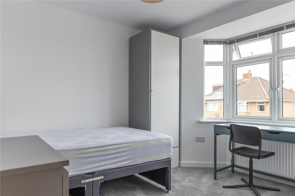 Property photo 1 of 15 A Bright And Tidy Room Featuring A Large Window Th...
