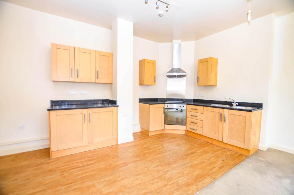 Property photo 3 of 9 Kitchen Area