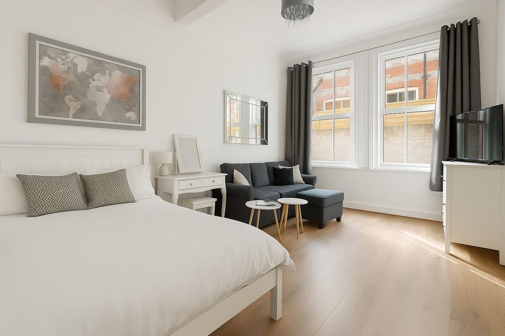 Property photo 3 of 5 Serene Daylight Bedroom With Modern Touches.Jpeg