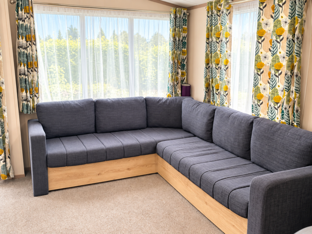 Property photo 2 of 5 Bright Lounge With Spacious L Shaped Sofa And Large Windows