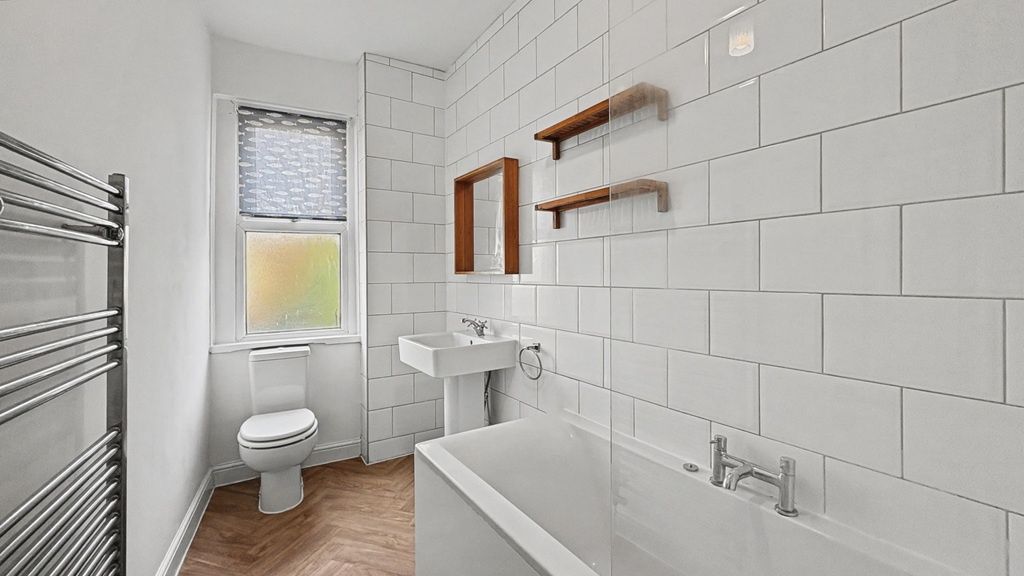 Property photo 2 of 10 Bright, Modern Bathroom With White Subway Tiles, A...