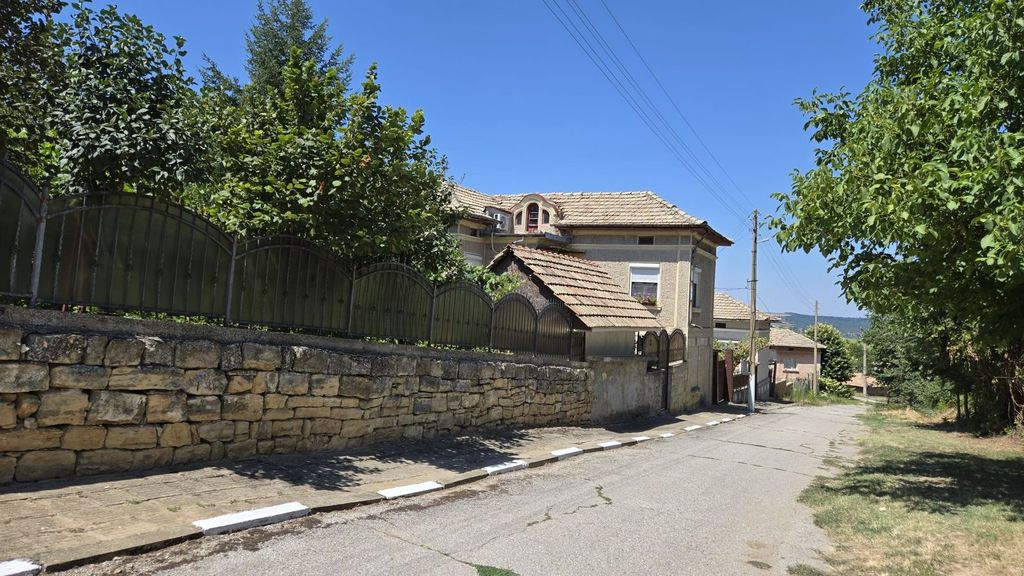 Property photo 3 of 100 Stone Wall Topped With Metal Fencing Enclosing The Garden Area Beside The Bulgarian House.