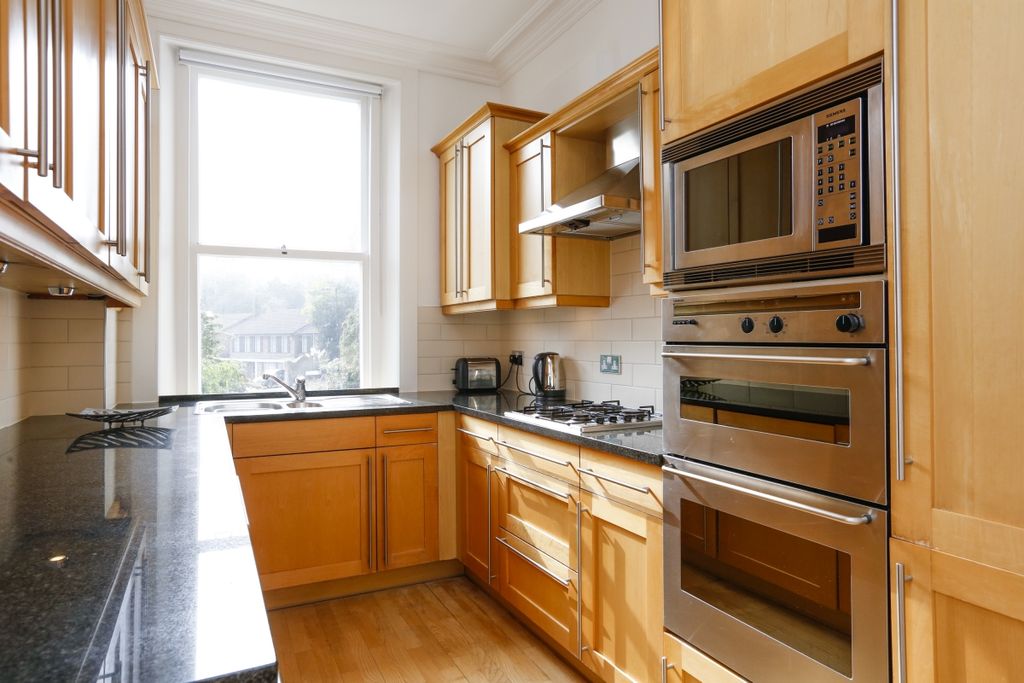 Property photo 2 of 8 Kitchen