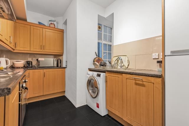 Property photo 2 of 12 Kitchen