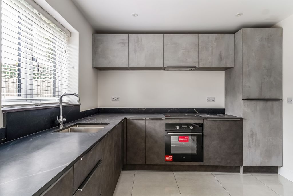 Property photo 3 of 12 Kitchen