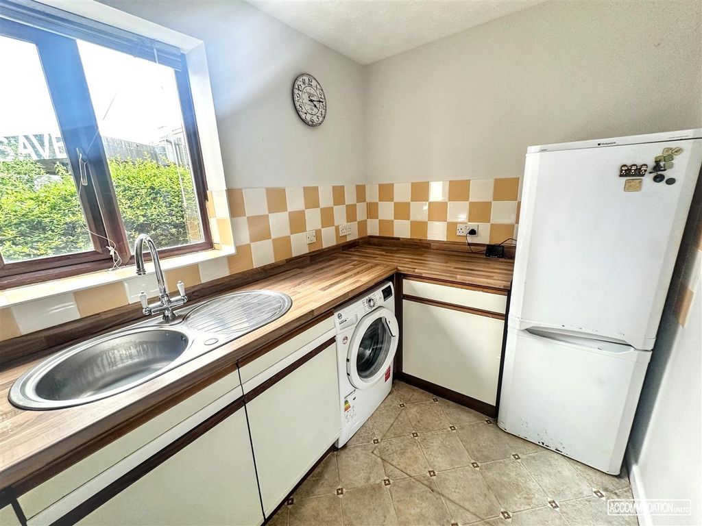 Property photo 1 of 5 Bright Kitchen With Modern Appliances And Window...
