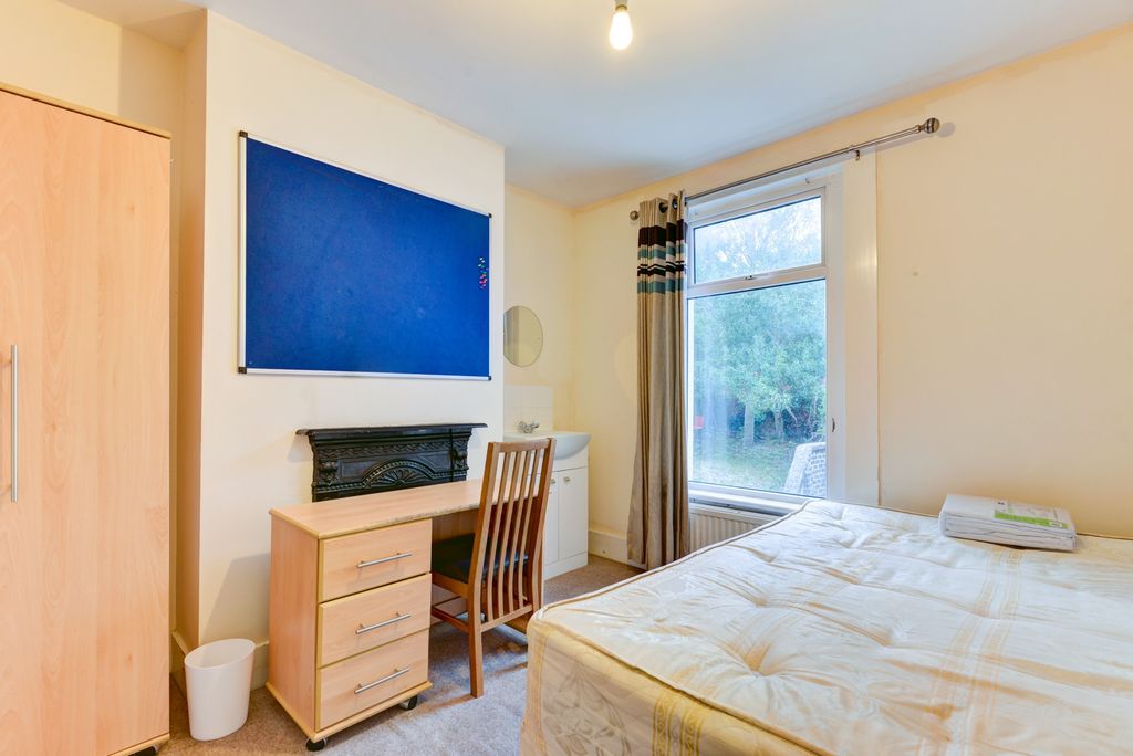Property photo 1 of 18 A Bright And Welcoming Bedroom Featuring A Comfort...