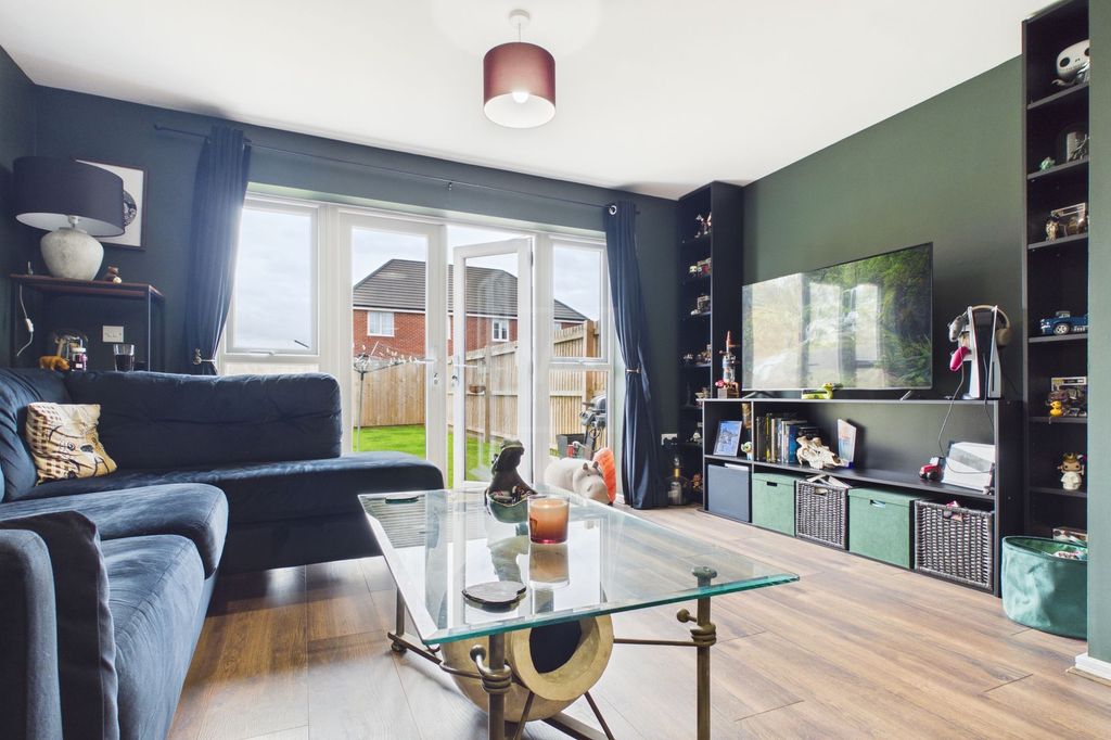 Property photo 3 of 16 Living Area