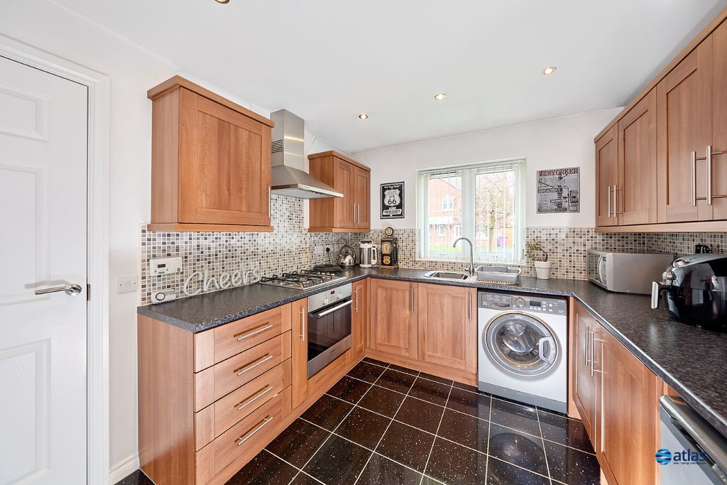 Property photo 3 of 13 Kitchen