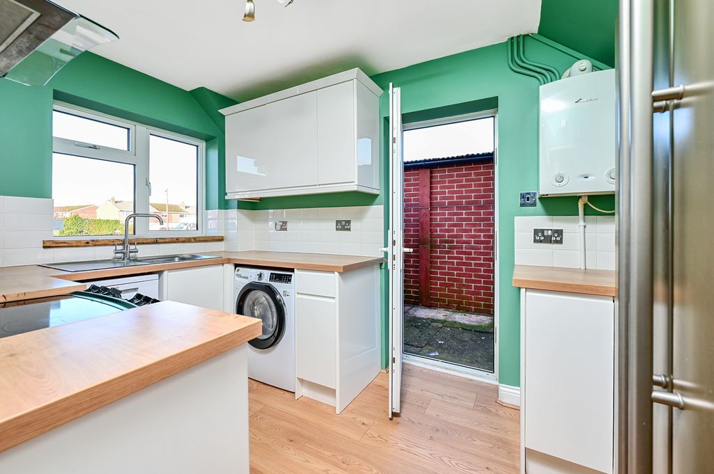 Property photo 2 of 12 Kitchen