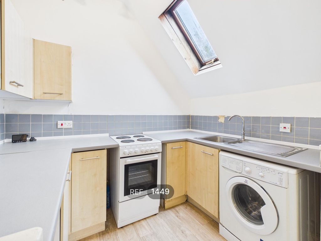 Property photo 3 of 15 Kitchen & Living Area