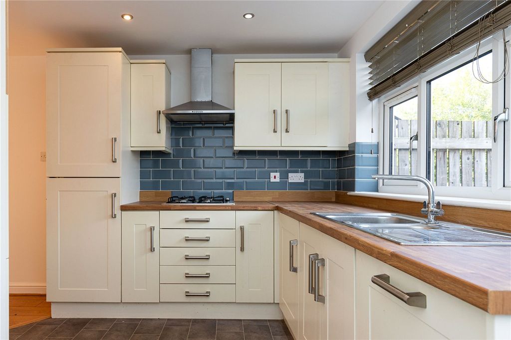 Property photo 2 of 13 Kitchen Area