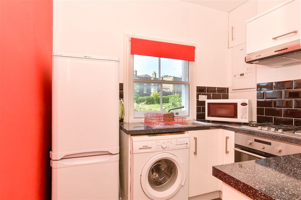 Property photo 3 of 8 Kitchen