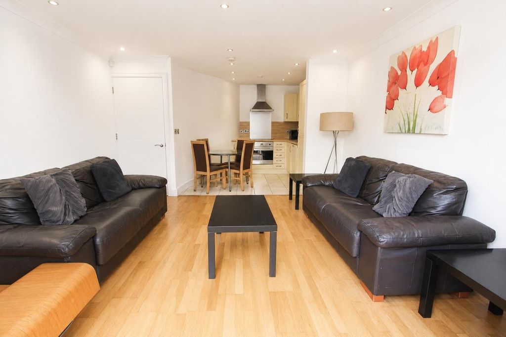 Property photo 1 of 12 Spacious Open-Plan Lounge With Sleek Leather Sofas...
