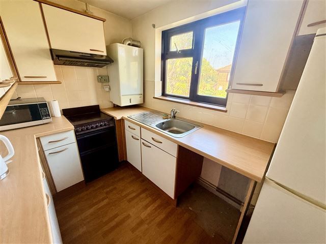 Property photo 3 of 7 Kitchen
