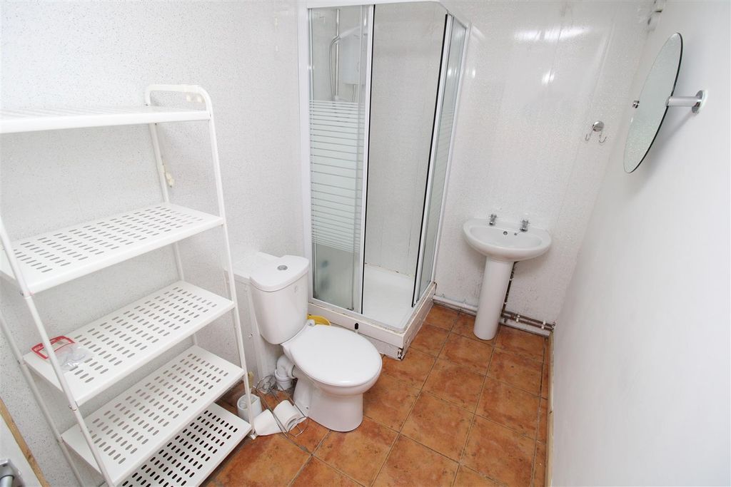 Property photo 3 of 3 Bright Bathroom With Ample Shelving And Shower...