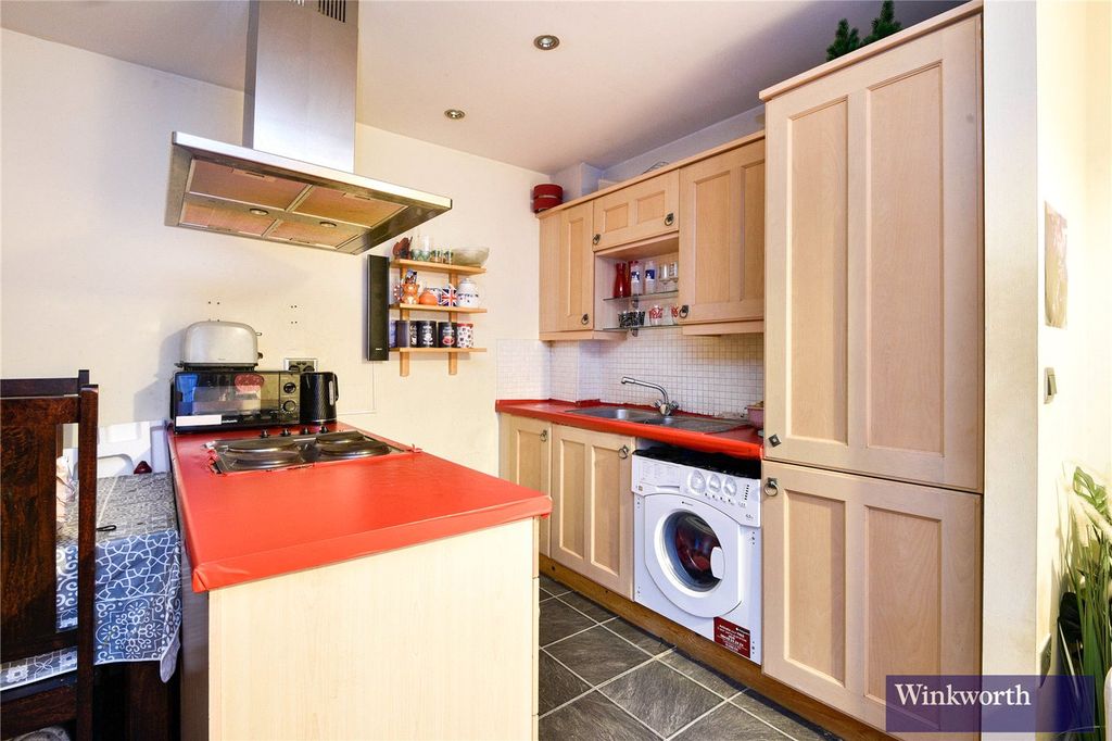 Property photo 3 of 8 Kitchen