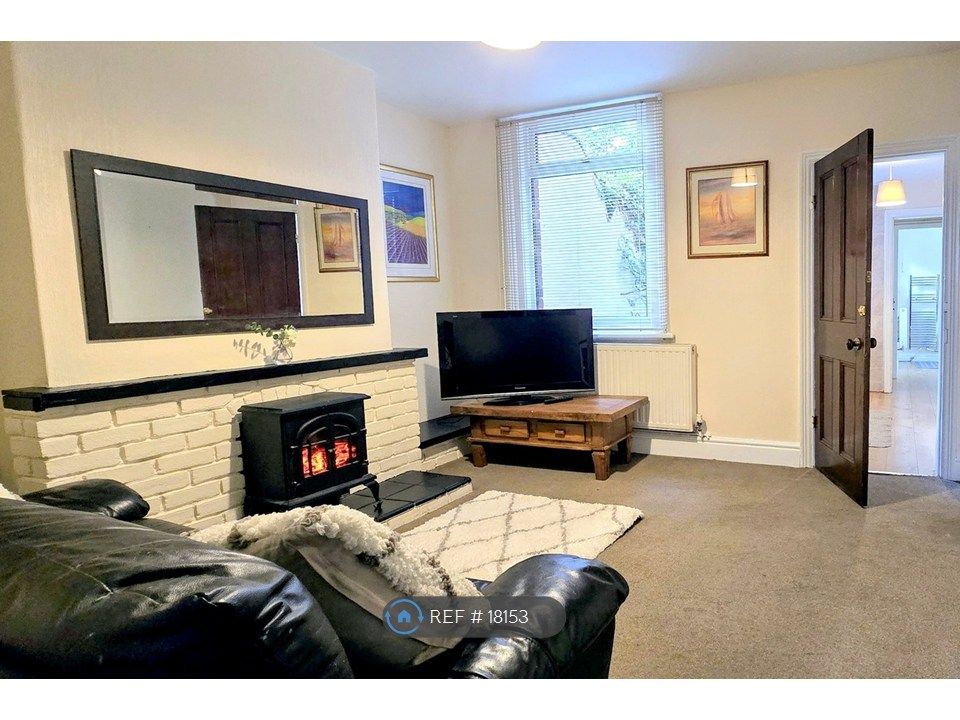 Property photo 3 of 12 Living Room 1