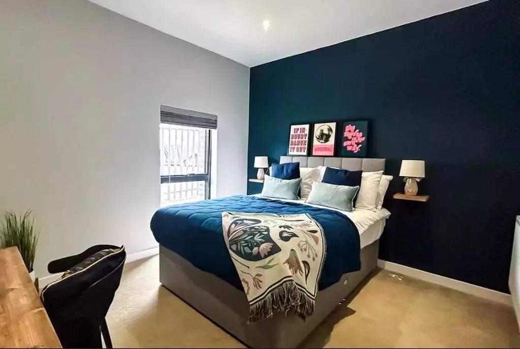 Property photo 3 of 6 A Stylish Master Bedroom Featuring A Comfortable d...