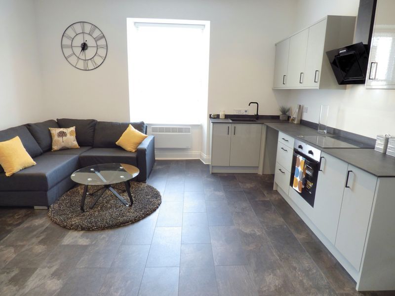 Property photo 3 of 7 Kitchen/ Living Area