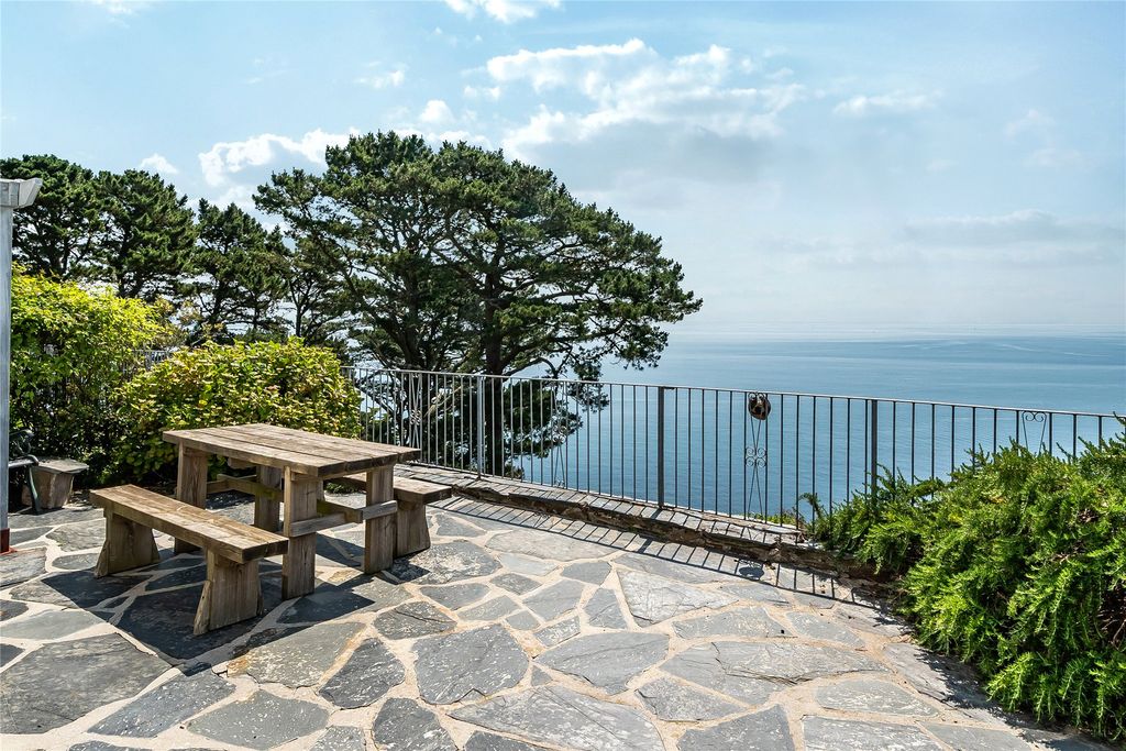 Property photo 2 of 21 Front Patio & Sea