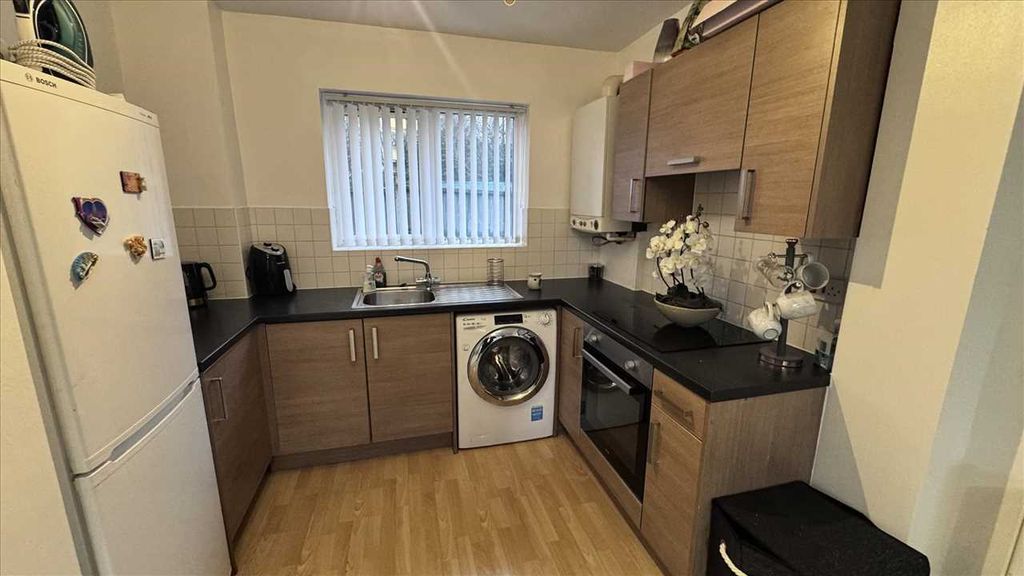 Property photo 3 of 4 Kitchen