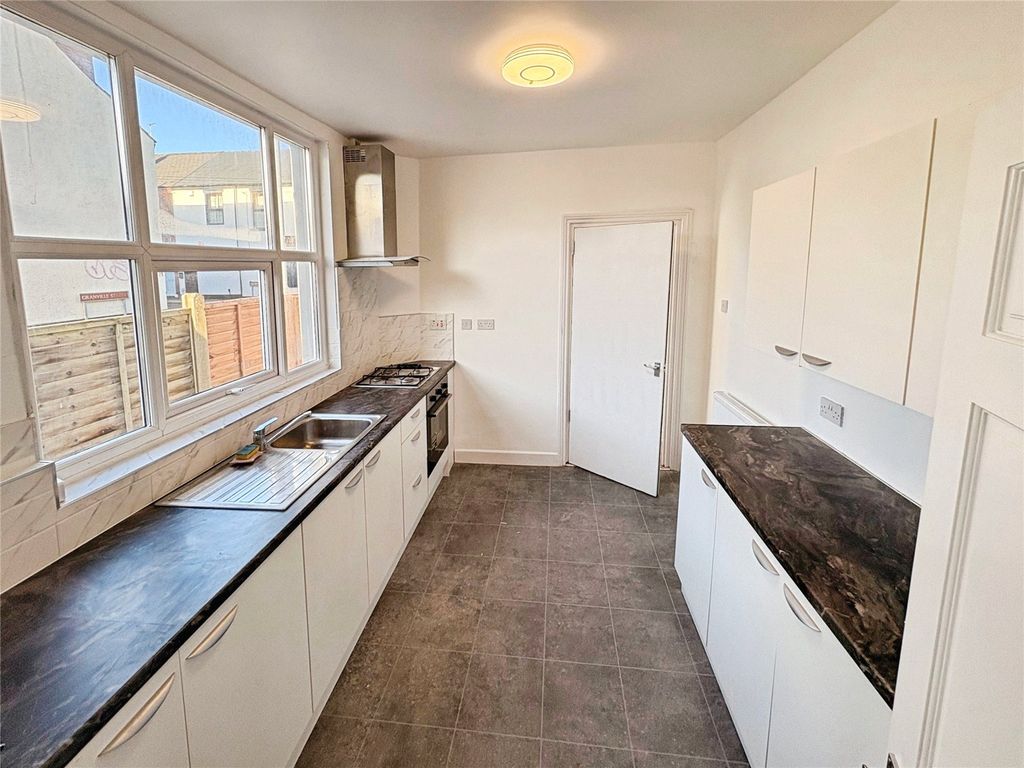 Property photo 2 of 12 Kitchen