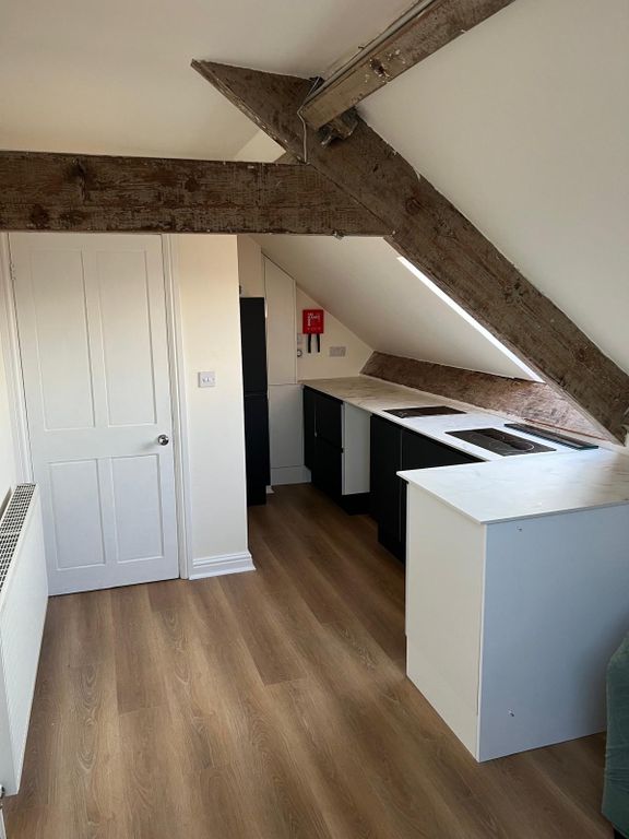 Property photo 1 of 6 Kitchen Area