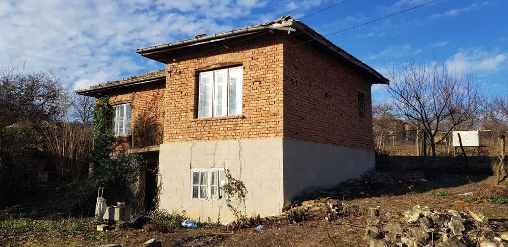 Property photo 3 of 49 Alternate Side Angle Showing The Brick And Stone Construction Of The Rural House With A Tiled Roof And Bare Trees Around.