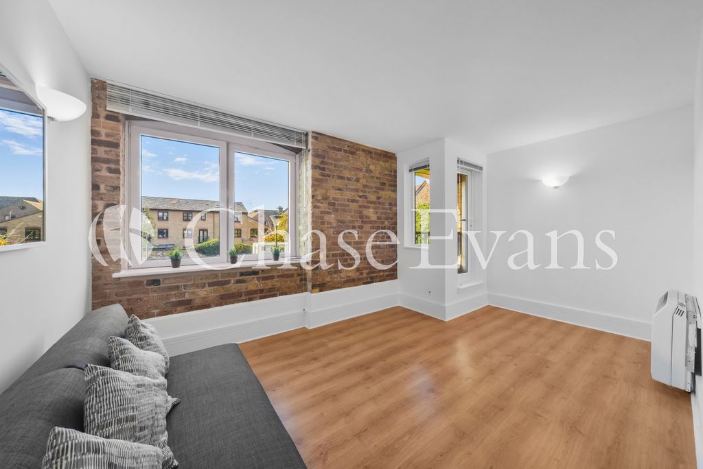 Property photo 1 of 10 Living Area