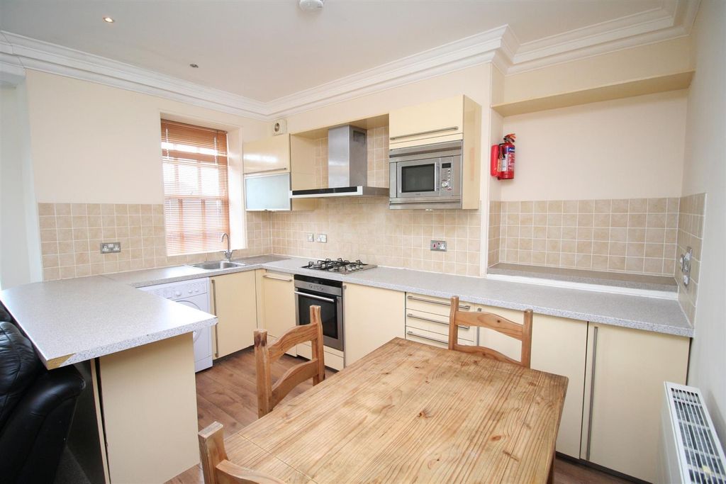Property photo 3 of 7 Kitchen