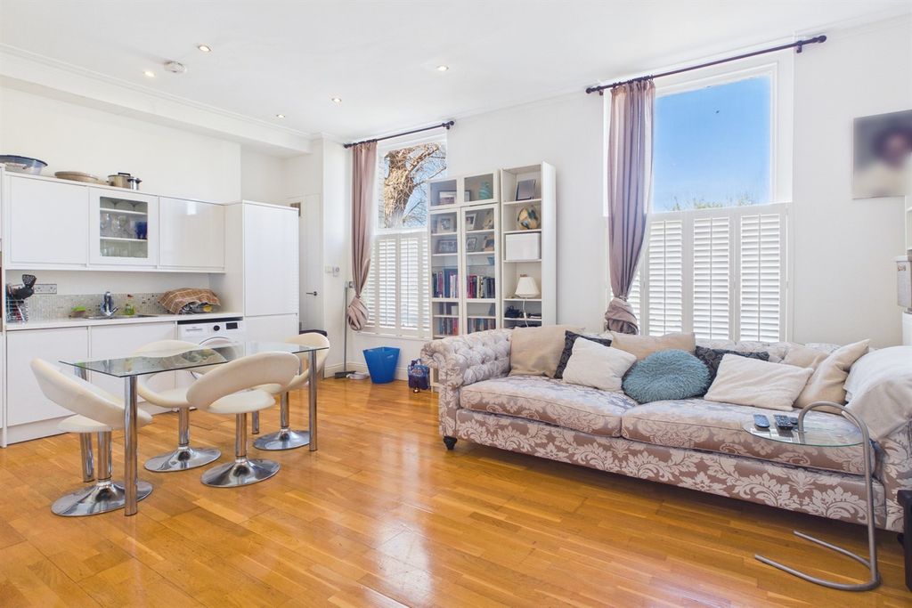 Property photo 2 of 13 Living Area