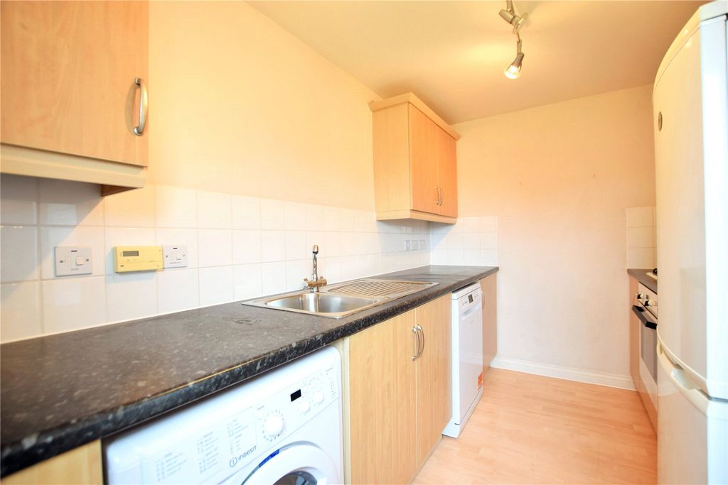 Property photo 3 of 7 Kitchen