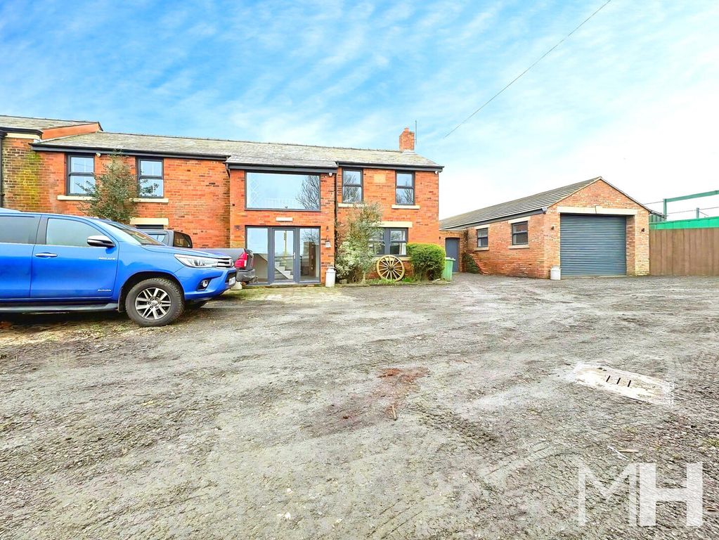 Property photo 1 of 18 Front (Exterior)