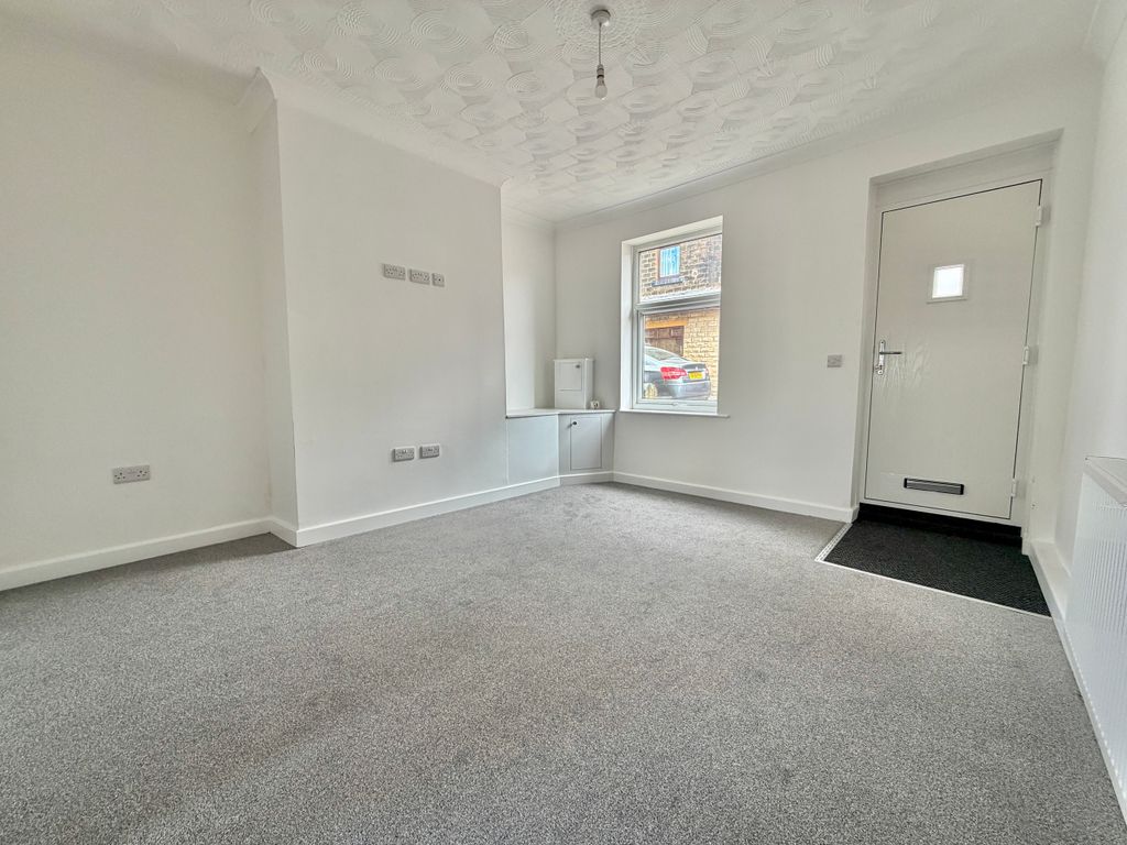 Property photo 3 of 12 Living Room