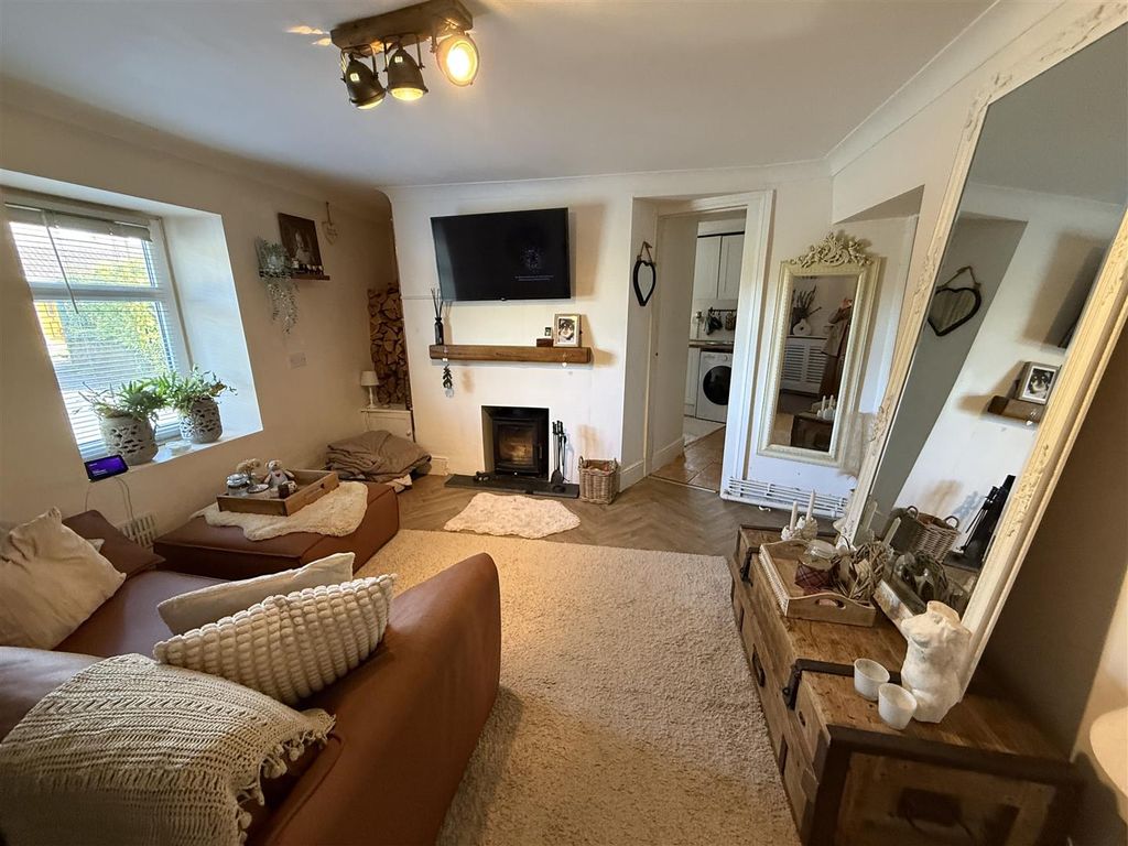 Property photo 2 of 24 Main Entrance Into Living Room