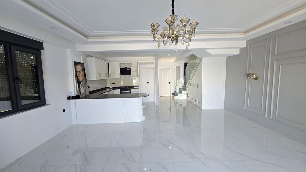 Property photo 3 of 10 Immaculate Villa For Sale In Antalya, Belek With A Private Pool - Spacious Living Room With An American Kitchen