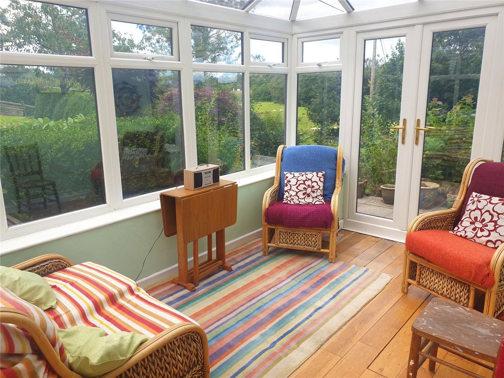 Property photo 3 of 11 Conservatory